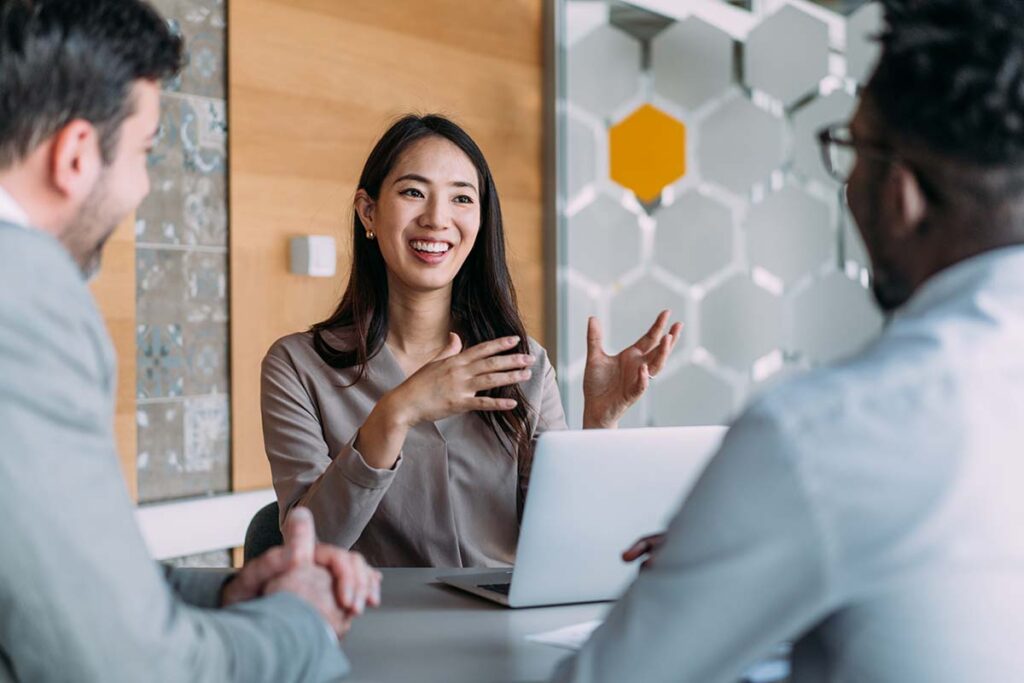 Three Business professionals in meeting